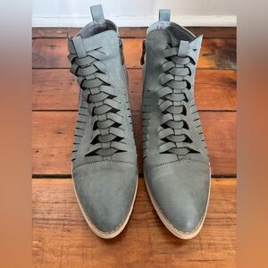 Sage green heeled booties with fun details